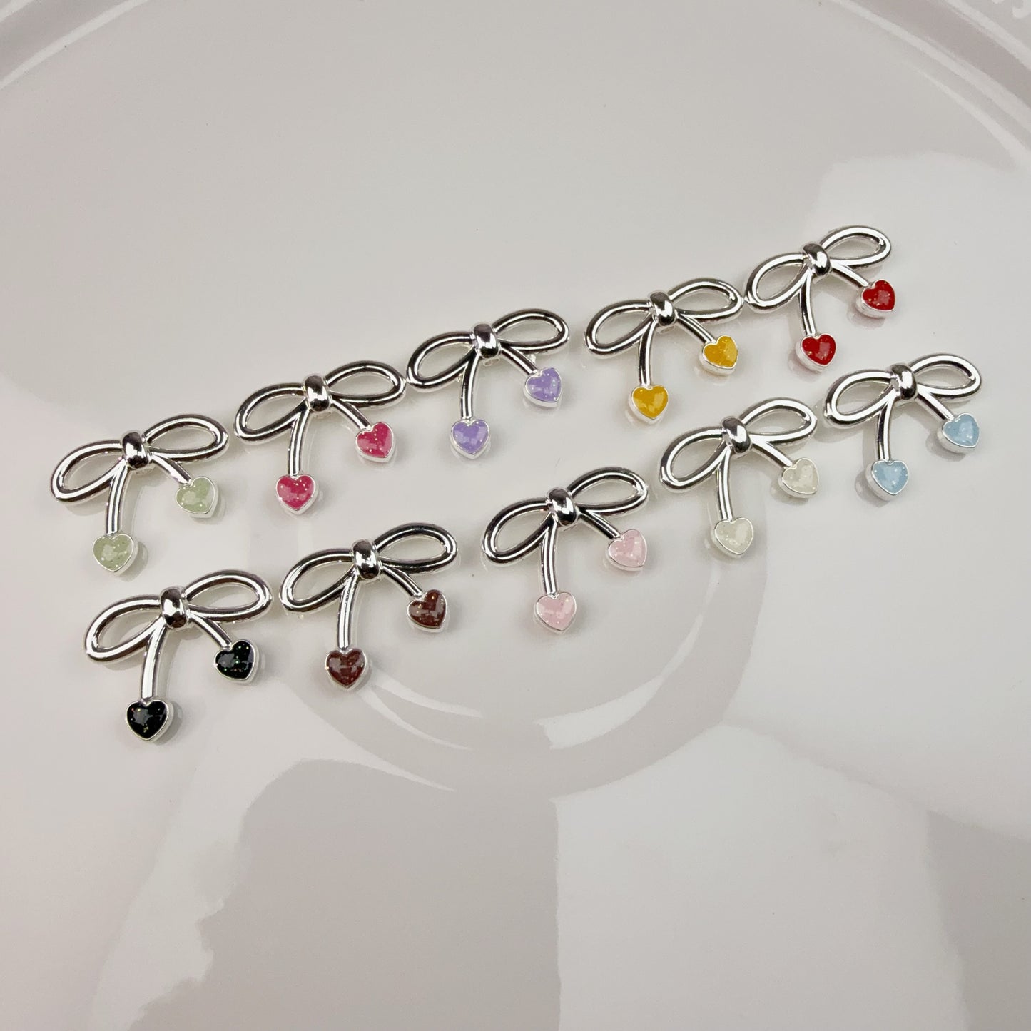 0 0今日新作 合金ーシルバーハートリボン レジン加工(0320)