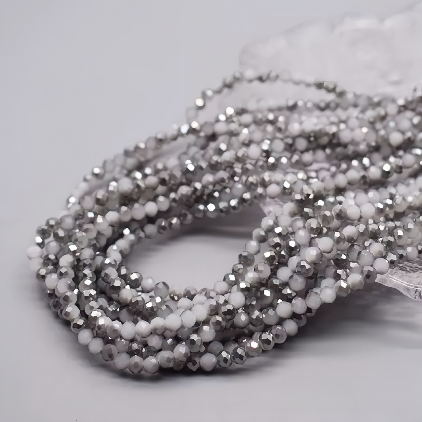 0 0今日新作 メッキ半銀ボタンカット−4ミリ ガラス(0214)